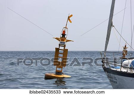 Stock Image - "Yellow warning buoys from the tsunami early warning system, Ko Phi Phi Island, Phuket, Thailand, Asia". Fotosearch