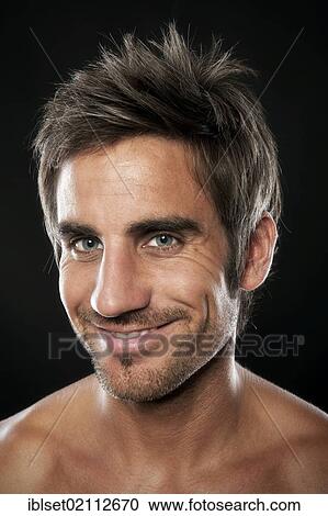 "Young, attractive man with a friendly smile, portrait" View Large Photo Image Stock Image - "Young, attractive man with a friendly smile, portrait". Fotosearch