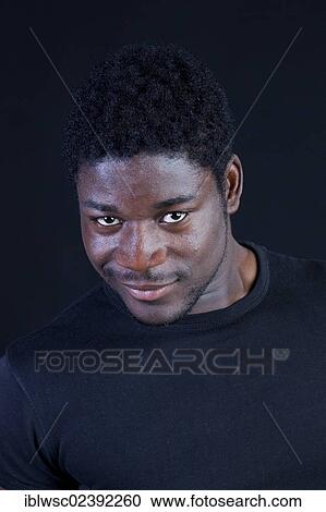 "Young black man, portrait" View Large Photo Image Stock Image - "Young black man, portrait". Fotosearch