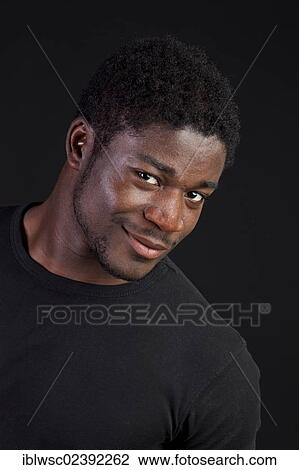 "Young black man, portrait" View Large Photo Image Stock Image - "Young black man, portrait". Fotosearch