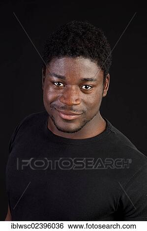Stock Photograph - "Young black man, portrait". Fotosearch