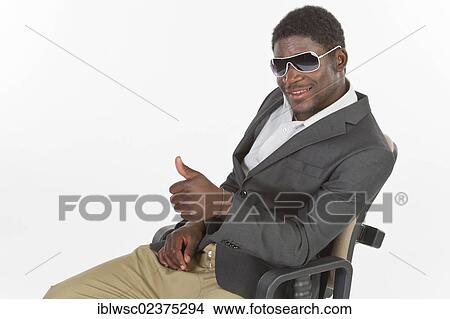 Picture - Young black man with sunglasses. Fotosearch