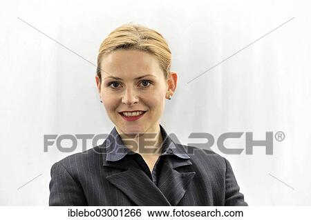 Stock Photograph - "Young businesswoman, Schwabisch Gmund, Ostalbkreis, Baden-Wurttemberg, Germany, Europe". Fotosearch