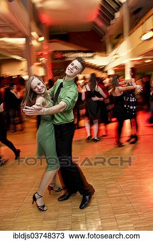 "Young couple dancing at the prom of a dance school, Germany, Europe" View Large Photo Image Stock Image - "Young couple dancing at the prom of a dance school, Germany, Europe". Fotosearch