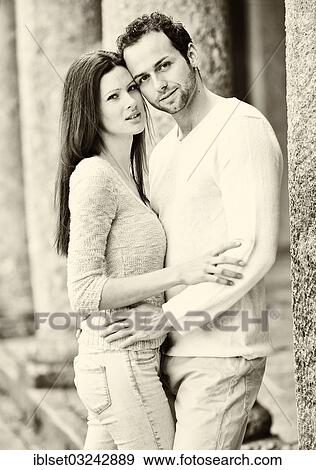 Stock Photo - "Young couple embracing, Austria, Europe". Fotosearch