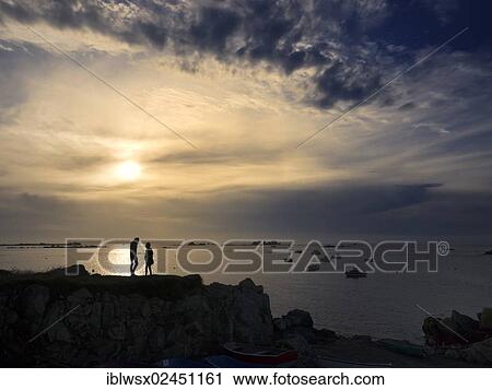 "Young couple in silhouette on an Atlantic beach near Plouguerneau, Brittany, Finistere, France, Europe, PublicGround, Europe" View Large Photo Image Stock Image - "Young couple in silhouette on an Atlantic beach near Plouguerneau, Brittany, Finistere, France, Europe, PublicGround, Europe". Fotosearch