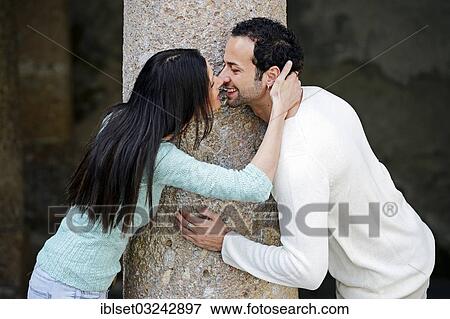 "Young couple kissing, Austria, Europe" View Large Photo Image Stock Photo - "Young couple kissing, Austria, Europe". Fotosearch