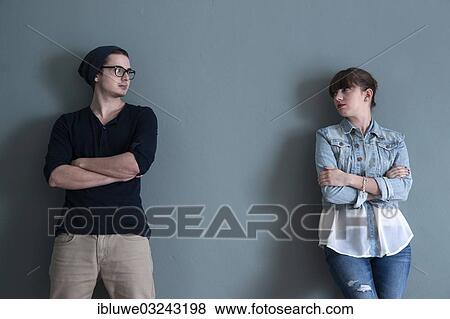 "Young couple leaning on a wall, apart from each other, Mannheim, Baden-Wurttemberg, Germany, Europe" View Large Photo Image Stock Photo - "Young couple leaning on a wall, apart from each other, Mannheim, Baden-Wurttemberg, Germany, Europe". Fotosearch