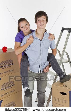 Young couple on moving day View Large Photo Image Stock Image - Young couple on moving day. Fotosearch