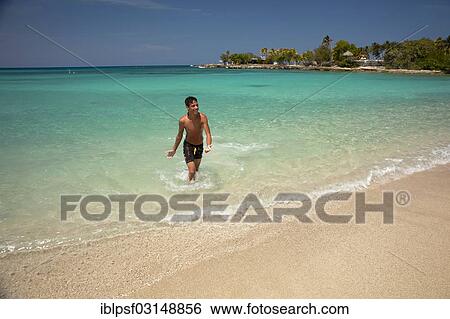 "Young Cuban man on Playa Bacuranao beach, Playas del Este, Habana del Este, Havana, Havana Province, Cuba, North America" View Large Photo Image Stock Photograph - "Young Cuban man on Playa Bacuranao beach, Playas del Este, Habana del Este, Havana, Havana Province, Cuba, North America". Fotosearch