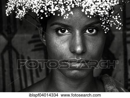 Young dark-skinned woman with flower wreath on head View Large Photo Image Picture - Young dark-skinned woman with flower wreath on head. Fotosearch