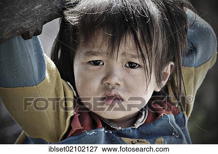 Stock Photo - "Young girl, portrait, Laos, Southeast Asia, Asia". Fotosearch
