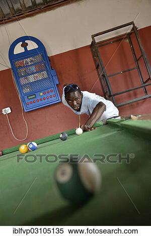 "Young Himba man playing billiards in a bar, Okongwati, Kaokoland, Kunene, Namibia, Africa" View Large Photo Image Stock Photography - "Young Himba man playing billiards in a bar, Okongwati, Kaokoland, Kunene, Namibia, Africa". Fotosearch