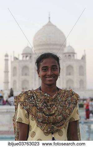 "Young Indian woman in a sari in front of the Taj Mahal, Agra, Uttar Pradesh, India, Asia" View Large Photo Image Stock Image - "Young Indian woman in a sari in front of the Taj Mahal, Agra, Uttar Pradesh, India, Asia". Fotosearch
