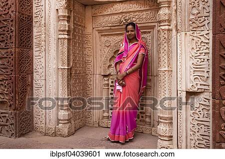 "Young Indian woman posing in the Qutub Minar Complex or Qutb Complex, UNESCO World Heritage Site, Delhi, India, Asia" View Large Photo Image Stock Image - "Young Indian woman posing in the Qutub Minar Complex or Qutb Complex, UNESCO World Heritage Site, Delhi, India, Asia". Fotosearch