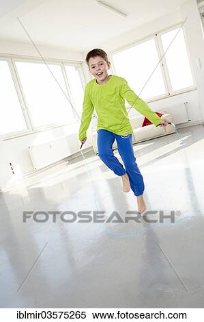 "Young jumping rope in casual clothes, Germany, Europe" View Large Photo Image Stock Photography - "Young jumping rope in casual clothes, Germany, Europe". Fotosearch