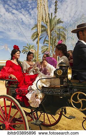 "Young ladies wearing gypsy dresses at the Feria del Caballo Horse Fair, Jerez de la Frontera, Cadiz province, Andalusia, Spain, Europe" View Large Photo Image Stock Photograph - "Young ladies wearing gypsy dresses at the Feria del Caballo Horse Fair, Jerez de la Frontera, Cadiz province, Andalusia, Spain, Europe". Fotosearch