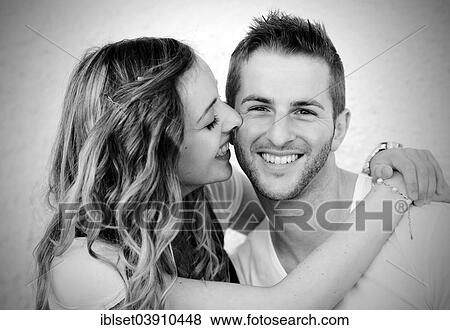 "Young man and a young woman, smiling lovers" View Large Photo Image Stock Photo - "Young man and a young woman, smiling lovers". Fotosearch