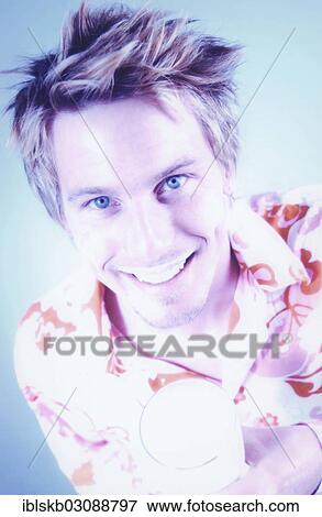 Stock Photo - Young man drinking milk. Fotosearch