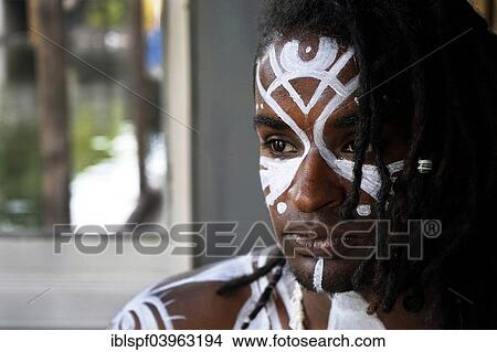 Picture - "Young man painted in Polynesian patterns, portrait, Berlin, Germany, Europe". Fotosearch