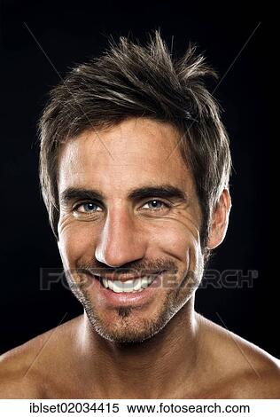 "Young man smiling, portrait" View Large Photo Image Stock Photography - "Young man smiling, portrait". Fotosearch