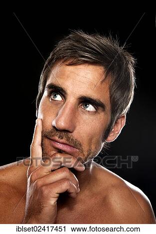 Young man thinking, Portrait View Large Photo Image Stock Image - Young man thinking, Portrait. Fotosearch