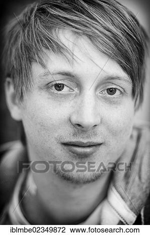 "Young man with a fashionable hairstyle, portrait" View Large Photo Image Stock Image - "Young man with a fashionable hairstyle, portrait". Fotosearch