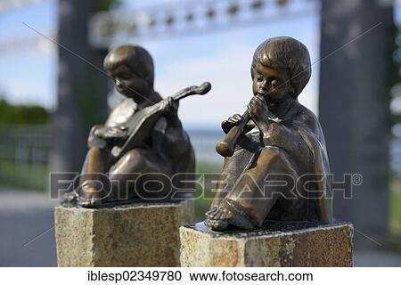 "Young Musicians, bronze sculpture by Helmut Bourger, Kurhaus spa building, Baltic Sea resort town of Binz, Binz, Rugen, Mecklenburg-Western Pomerania, Germany, Europe" View Large Photo Image Stock Image - "Young Musicians, bronze sculpture by Helmut Bourger, Kurhaus spa building, Baltic Sea resort town of Binz, Binz, Rugen, Mecklenburg-Western Pomerania, Germany, Europe". Fotosearch