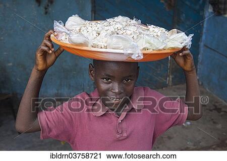 "Young popcorn seller at a street market, Bo, Southern Province, Sierra Leone, Africa" View Large Photo Image Stock Image - "Young popcorn seller at a street market, Bo, Southern Province, Sierra Leone, Africa". Fotosearch