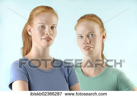 "Young red-haired twin sisters, portrait" View Large Photo Image Stock Photo - "Young red-haired twin sisters, portrait". Fotosearch