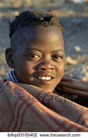 "Young shepherdess from the Himba people, Ombombo, Kaokoland, Kunene, Namibia, Africa" View Large Photo Image Stock Image - "Young shepherdess from the Himba people, Ombombo, Kaokoland, Kunene, Namibia, Africa". Fotosearch