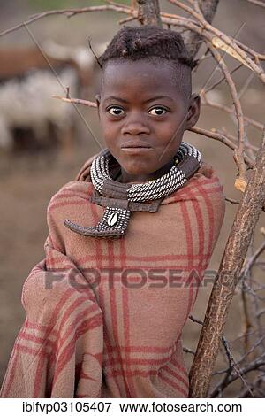 "Young shepherdess from the Himba people, Ombombo, Kaokoland, Kunene, Namibia, Africa" View Large Photo Image Stock Photo - "Young shepherdess from the Himba people, Ombombo, Kaokoland, Kunene, Namibia, Africa". Fotosearch
