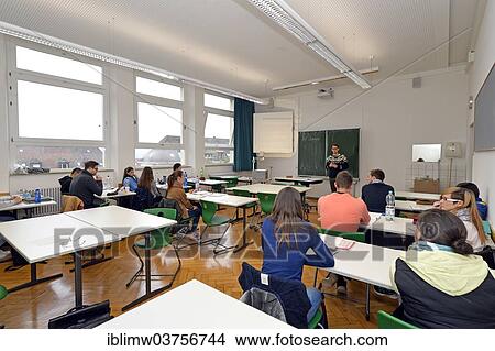 Picture - "Young trainee teacher teaching a class, classroom, Stuttgart, Baden-Wurttemberg, Germany, Europe". Fotosearch