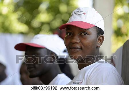 Stock Image - "Young woman attending a training session for disaster relief workers at the Red Cross, Palmiste-a-Vin, Leogane, Haiti, North America". Fotosearch