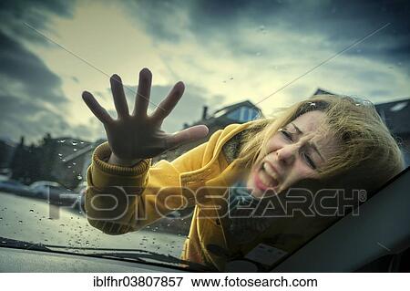 "Young woman hitting the windshield of a car during an accident, Grevenbroich, North Rhine-Westphalia, Germany, Europe" View Large Photo Image Stock Photo - "Young woman hitting the windshield of a car during an accident, Grevenbroich, North Rhine-Westphalia, Germany, Europe". Fotosearch