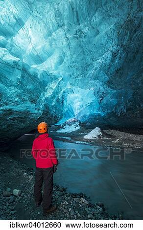 "Young woman in ice cave below the Vatnajokull Glacier, Iceland, Europe" View Large Photo Image Stock Image - "Young woman in ice cave below the Vatnajokull Glacier, Iceland, Europe". Fotosearch