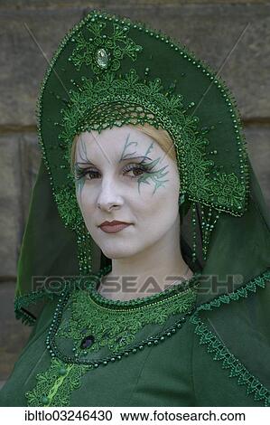 Stock Image - "Young woman in scene clothes, inspired by Russian folklore, Wave-Gotik-Treffen, Leipzig, Saxony, Germany, Europe". Fotosearch