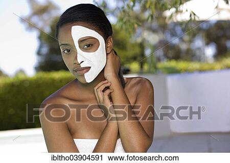 Stock Image - Young woman is enjoying a wellness and spa day. Fotosearch
