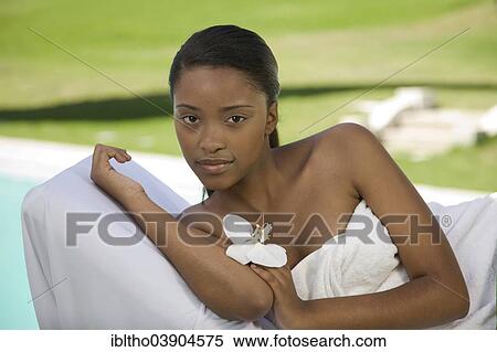Young woman is enjoying a wellness and spa day View Large Photo Image Stock Photography - Young woman is enjoying a wellness and spa day. Fotosearch