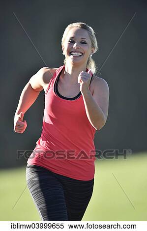 "Young woman jogging, Germany, Europe" View Large Photo Image Stock Photography - "Young woman jogging, Germany, Europe". Fotosearch