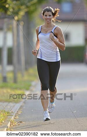 "Young woman jogging, Stuttgart, Baden-Wuerttemberg, Germany, Europe, PublicGround, Europe" View Large Photo Image Stock Image - "Young woman jogging, Stuttgart, Baden-Wuerttemberg, Germany, Europe, PublicGround, Europe". Fotosearch