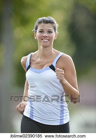 "Young woman jogging, Stuttgart, Baden-Wuerttemberg, Germany, Europe, PublicGround, Europe" View Large Photo Image Stock Photography - "Young woman jogging, Stuttgart, Baden-Wuerttemberg, Germany, Europe, PublicGround, Europe". Fotosearch