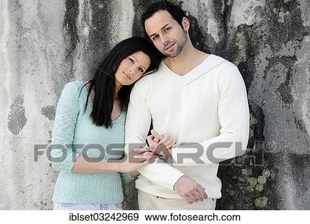 Stock Photo - "Young woman leaning on the shoulder of a young man, Austria, Europe". Fotosearch