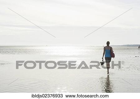 "Young woman on a Wadden Sea hiking tour, Wyk, Foehr island, North Frisia, Schleswig-Holstein, Germany, Europe" View Large Photo Image Stock Image - "Young woman on a Wadden Sea hiking tour, Wyk, Foehr island, North Frisia, Schleswig-Holstein, Germany, Europe". Fotosearch