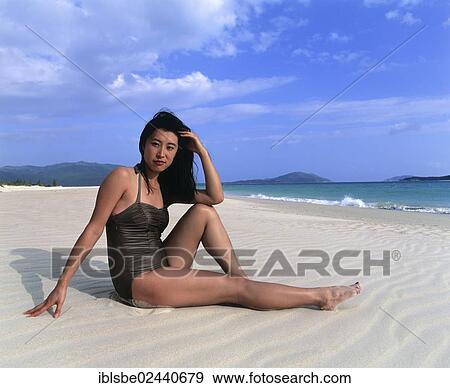 "Young woman on Dadonghai Beach, white sandy beach, Sanya, Hainan Island, China, Asia" View Large Photo Image Stock Photo - "Young woman on Dadonghai Beach, white sandy beach, Sanya, Hainan Island, China, Asia". Fotosearch