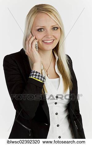 Young woman on the smartphone View Large Photo Image Stock Image - Young woman on the smartphone. Fotosearch