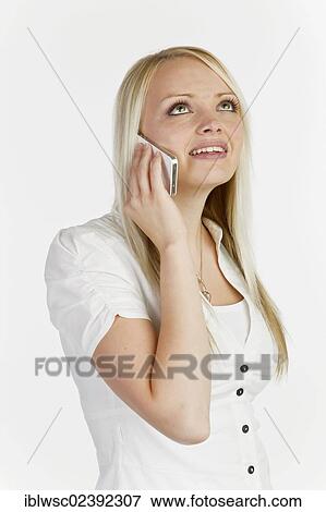 Stock Photo - Young woman on the smartphone. Fotosearch