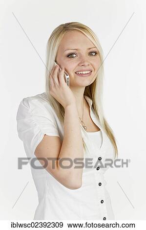 Young woman on the smartphone View Large Photo Image Stock Photo - Young woman on the smartphone. Fotosearch