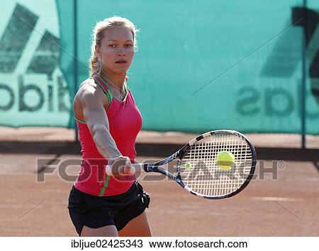 "Young woman playing tennis in a holiday club, Manavgat, Turkey, Asia" View Large Photo Image Stock Image - "Young woman playing tennis in a holiday club, Manavgat, Turkey, Asia". Fotosearch