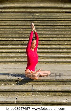 "Young woman practising Hatha-Yoga outdoors, here the pose padmasana, lotus pose" View Large Photo Image Stock Photo - "Young woman practising Hatha-Yoga outdoors, here the pose padmasana, lotus pose". Fotosearch